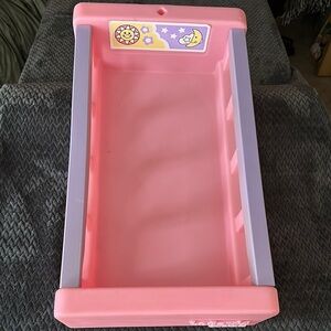 Pink and Purple Kids Baby doll cradle by today’s kid’s hard plastic sturdy clean